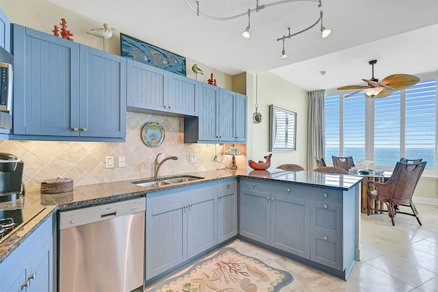 801 E Beach Dr Unit Bc2305, Galveston, TX 77550 - kitchen featuring dishwasher, a sink, a peninsula, and tasteful backsplash
