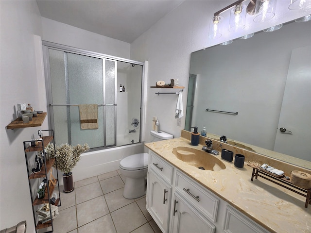 482 W Cattle Dr, Onalaska, TX 77360 - bathroom with vanity, toilet, tile patterned floors, and combined bath / shower with glass door