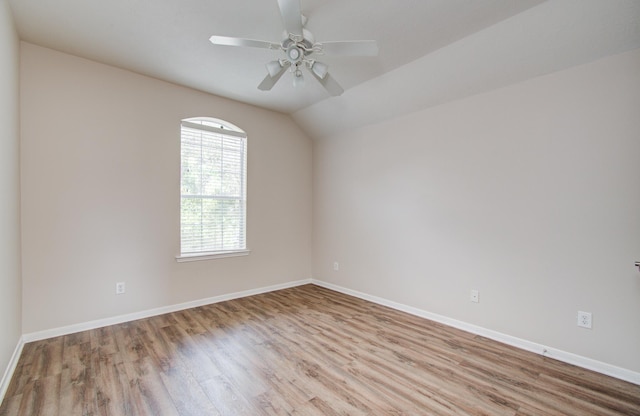 3410 Walden Creek Ln, Pearland, TX 77581 - unfurnished room with wood finished floors, ceiling fan, baseboards, and lofted ceiling