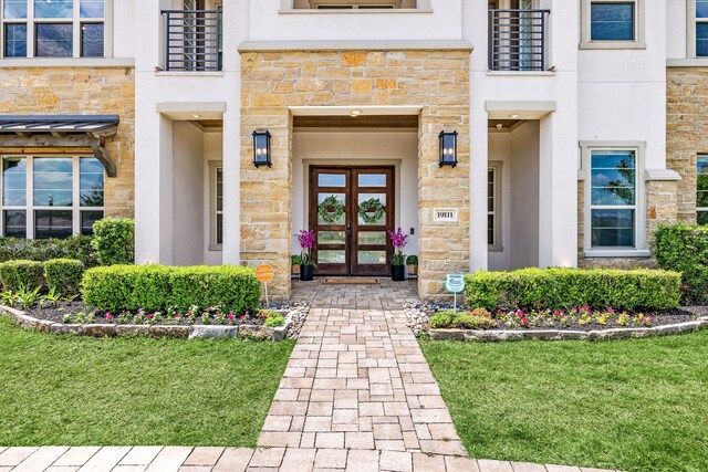 19111 N Frio River Cir, Cypress, TX 77433 - entrance to property with stone siding and stucco siding