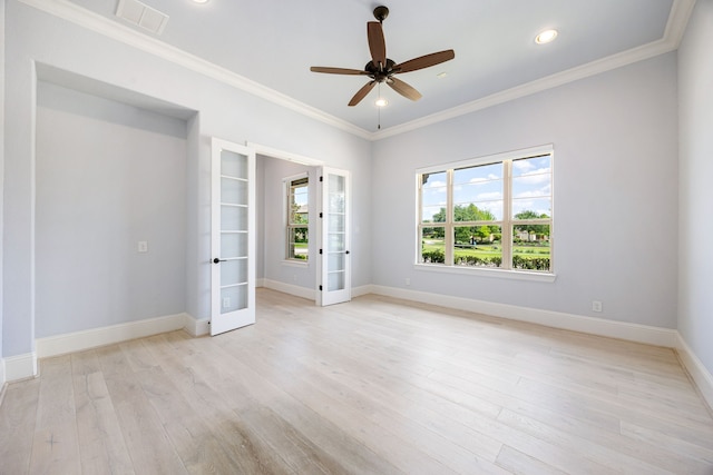 19111 N Frio River Cir, Cypress, TX 77433 - unfurnished room with french doors, light wood-style flooring, baseboards, ceiling fan, and recessed lighting