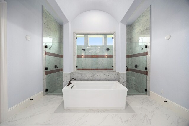 19111 N Frio River Cir, Cypress, TX 77433 - bathroom featuring a freestanding tub, a stall shower, baseboards, and marble finish flooring