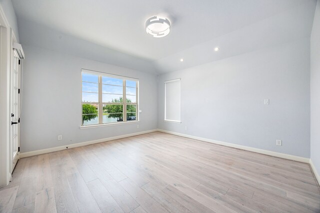 19111 N Frio River Cir, Cypress, TX 77433 - empty room with baseboards, light wood-style flooring, and recessed lighting