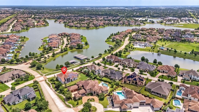19111 N Frio River Cir, Cypress, TX 77433 - aerial view of property and surrounding area featuring nearby suburban area and a large body of water