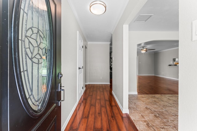 31614 Debbi Ln, Magnolia, TX 77355 - foyer entrance featuring ornamental molding, a ceiling fan, baseboards, and wood finished floors