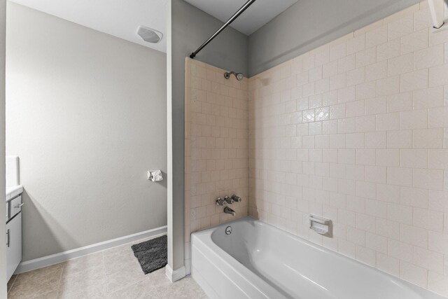 31614 Debbi Ln, Magnolia, TX 77355 - bathroom with vanity, baseboards, shower / bath combination, and tile patterned flooring