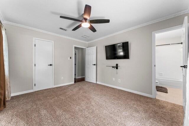 31614 Debbi Ln, Magnolia, TX 77355 - unfurnished bedroom with carpet, ornamental molding, ensuite bath, baseboards, and a ceiling fan