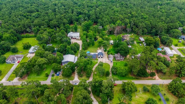 31614 Debbi Ln, Magnolia, TX 77355 - drone / aerial view of a heavily wooded area