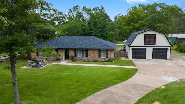 31614 Debbi Ln, Magnolia, TX 77355 - view of front of home with driveway, brick siding, and a shingled roof