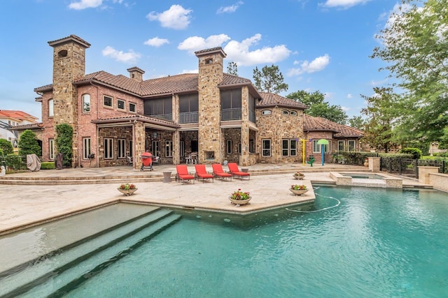 27919 Hansons Ct, Spring, TX 77386 - view of pool featuring a patio and a pool with connected hot tub