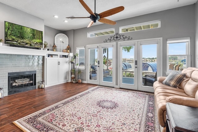 3 Key Harbour Dr, Conroe, TX 77356 - living area with french doors, ceiling fan, recessed lighting, wood finished floors, and plenty of natural light