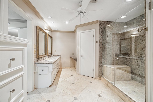 16201 Singapore Ln, Jersey Village, TX 77040 - bathroom with ornamental molding, double vanity, a ceiling fan, a stall shower, and baseboards