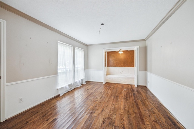 16201 Singapore Ln, Jersey Village, TX 77040 - empty room with ornamental molding, wood finished floors, and a wainscoted wall