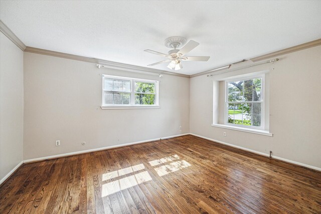 16201 Singapore Ln, Jersey Village, TX 77040 - unfurnished room with ornamental molding, baseboards, wood finished floors, and ceiling fan