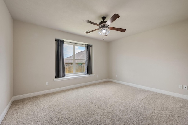1208 Robinsville Ct, College Station, TX 77845 - spare room with carpet, baseboards, and a ceiling fan