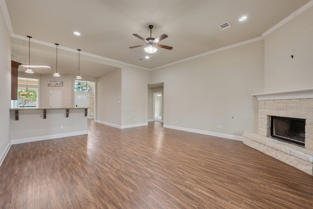 1208 Robinsville Ct, College Station, TX 77845 - unfurnished living room featuring dark wood-style floors, a ceiling fan, baseboards, a stone fireplace, and recessed lighting
