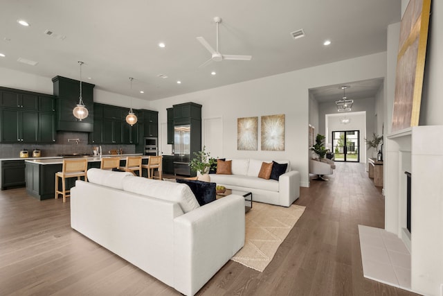 6727 Pine Haven Ct, Katy, TX 77493 - living area with recessed lighting, a ceiling fan, and wood finished floors