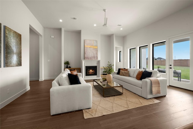 6727 Pine Haven Ct, Katy, TX 77493 - living area featuring wood finished floors, recessed lighting, a glass covered fireplace, baseboards, and ceiling fan