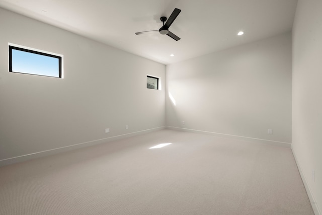 6727 Pine Haven Ct, Katy, TX 77493 - spare room with light carpet, ceiling fan, recessed lighting, and baseboards