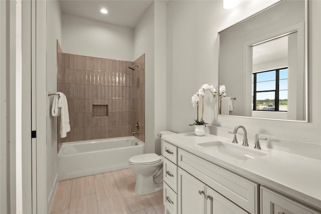 6727 Pine Haven Ct, Katy, TX 77493 - bathroom with vanity, toilet, bathtub / shower combination, and recessed lighting