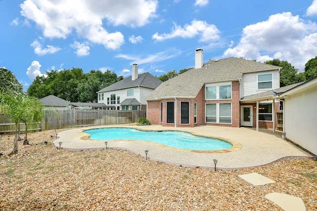 1623 Heddon Falls Dr, Sugar Land, TX 77479 - view of swimming pool with a fenced backyard and a patio area