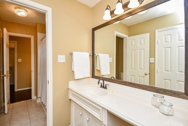 1623 Heddon Falls Dr, Sugar Land, TX 77479 - full bath with tile patterned floors, vanity, toilet, and baseboards