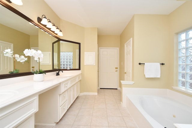 1623 Heddon Falls Dr, Sugar Land, TX 77479 - bathroom featuring a jetted tub, double vanity, tile patterned floors, and baseboards
