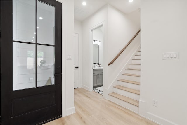 3735 Lydia St, Houston, TX 77021 - entrance foyer featuring wood finished floors, stairs, baseboards, and recessed lighting