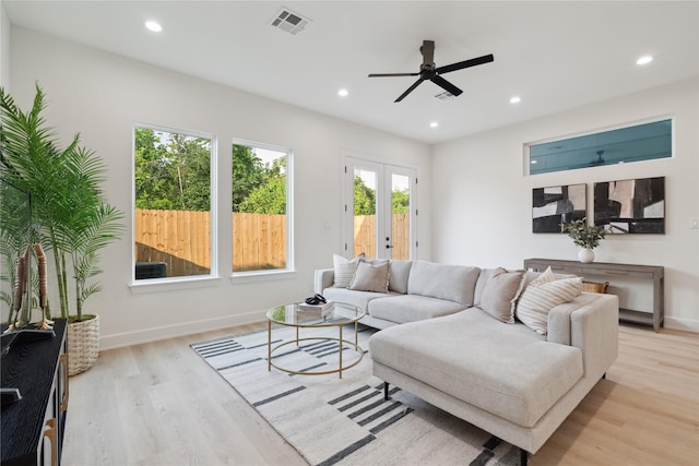 3735 Lydia St, Houston, TX 77021 - living room featuring a ceiling fan, wood finished floors, recessed lighting, french doors, and baseboards