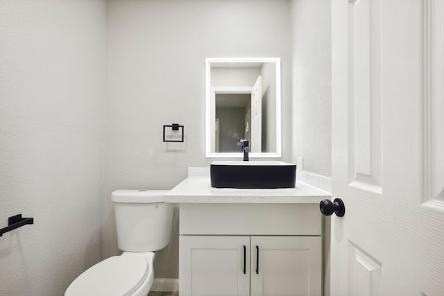 10007 Sagedowne Ln, Houston, TX 77089 - half bathroom with toilet and vanity