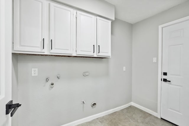 10007 Sagedowne Ln, Houston, TX 77089 - laundry room with hookup for a gas dryer, cabinet space, baseboards, and washer hookup
