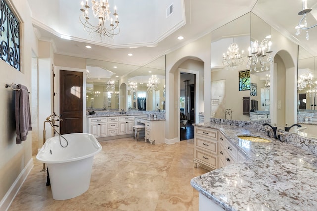 13 Pleasant Shadows Dr, Spring, TX 77389 - full bath featuring a chandelier, a freestanding bath, two vanities, crown molding, and a high ceiling