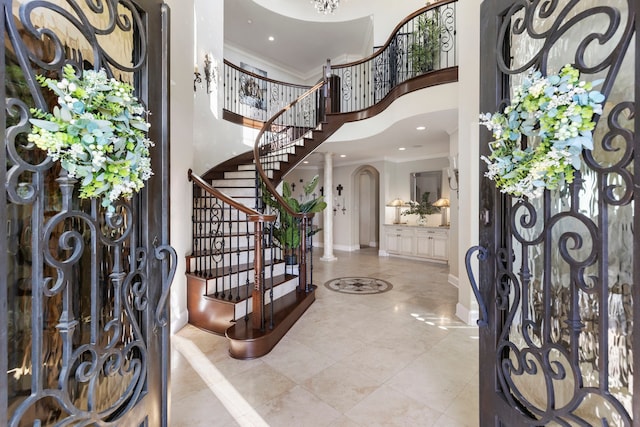 13 Pleasant Shadows Dr, Spring, TX 77389 - foyer entrance featuring ornamental molding, a towering ceiling, baseboards, stairway, and recessed lighting