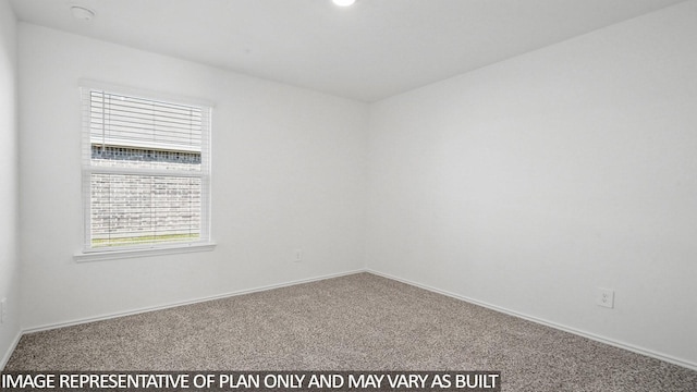 1354 Heather Rosewood Ln, Conroe, TX 77301 - carpeted spare room featuring baseboards and a smoke detector