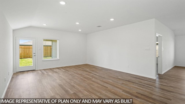 1354 Heather Rosewood Ln, Conroe, TX 77301 - unfurnished living room featuring wood finished floors, recessed lighting, vaulted ceiling, and baseboards