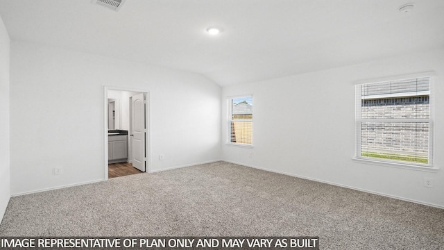 1354 Heather Rosewood Ln, Conroe, TX 77301 - unfurnished bedroom featuring carpet flooring, lofted ceiling, baseboards, and ensuite bath