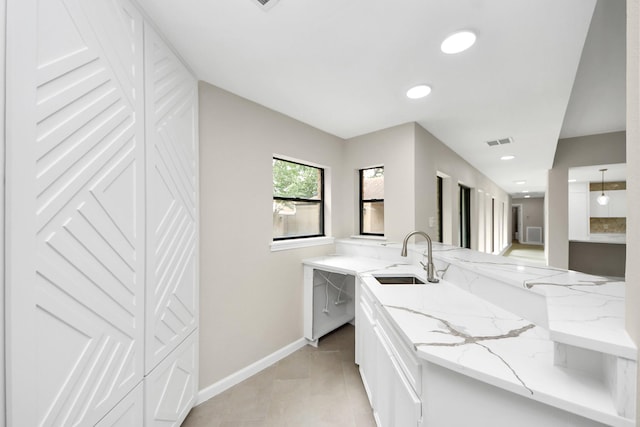 15707 Steamboat Ln, Houston, TX 77079 - bathroom with a closet, baseboards, recessed lighting, tile patterned flooring, and vanity