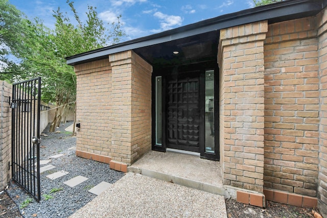 15707 Steamboat Ln, Houston, TX 77079 - property entrance with brick siding and a gate
