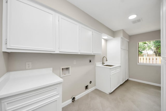 15707 Steamboat Ln, Houston, TX 77079 - laundry room featuring hookup for an electric dryer, washer hookup, cabinet space, and baseboards