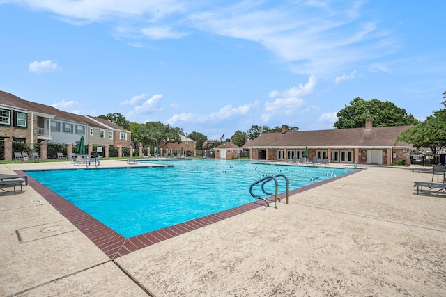 1145 Country Place Dr, Houston, TX 77079 - community pool with a patio area