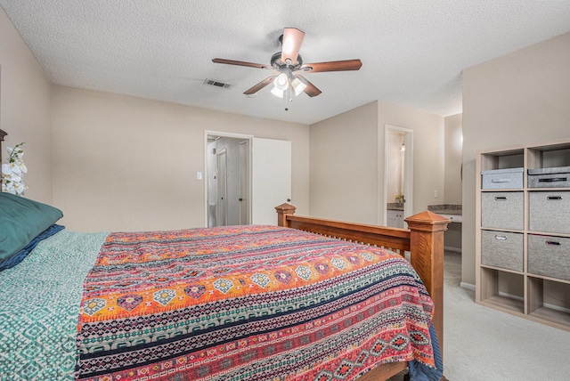 1145 Country Place Dr, Houston, TX 77079 - bedroom with carpet flooring, ceiling fan, and a textured ceiling