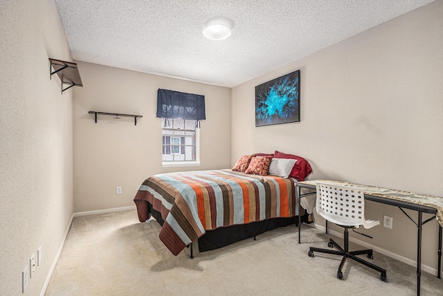 1145 Country Place Dr, Houston, TX 77079 - carpeted bedroom with a textured ceiling and baseboards