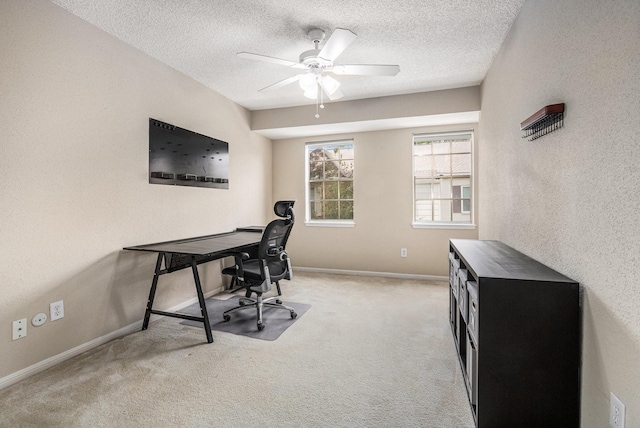 1145 Country Place Dr, Houston, TX 77079 - carpeted home office with a ceiling fan, a textured ceiling, and baseboards