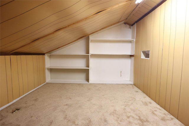 6416 Dawnridge Dr, Houston, TX 77035 - additional living space with lofted ceiling, carpet flooring, and wooden walls