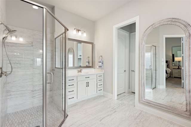 127 Evening Tide Ct, Conroe, TX 77318 - ensuite bathroom featuring a stall shower, vanity, marble finish floors, and baseboards