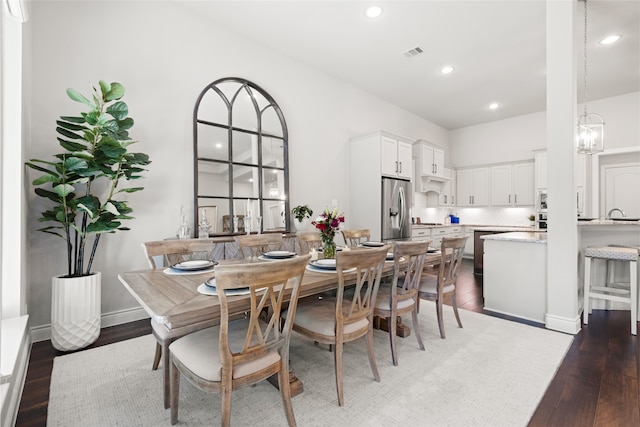 127 Evening Tide Ct, Conroe, TX 77318 - dining space with hardwood / wood-style flooring, recessed lighting, and a chandelier