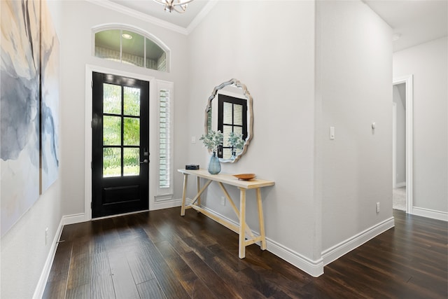 127 Evening Tide Ct, Conroe, TX 77318 - entryway with crown molding, wood finished floors, baseboards, and a chandelier