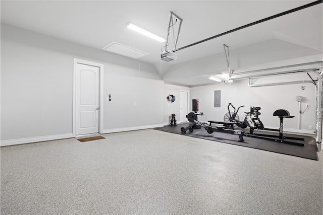 127 Evening Tide Ct, Conroe, TX 77318 - workout room featuring a garage, electric panel, and baseboards