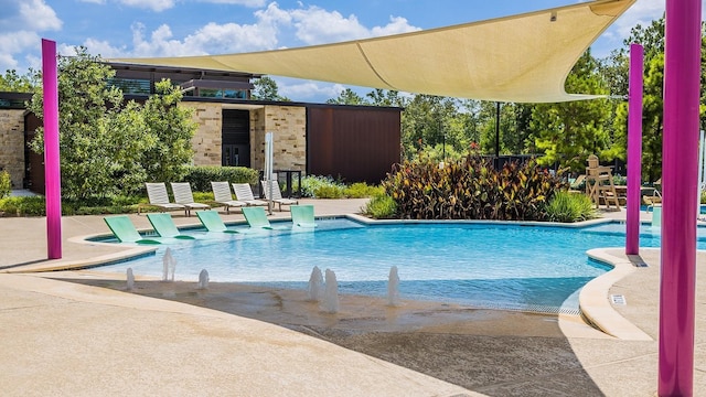127 Evening Tide Ct, Conroe, TX 77318 - community pool with a patio area