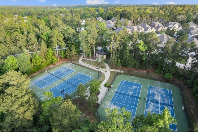 127 Evening Tide Ct, Conroe, TX 77318 - view of property location with a forest